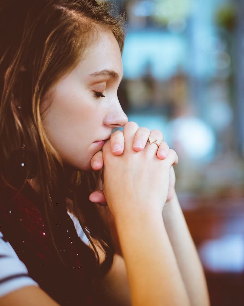 Anxious girl meditating